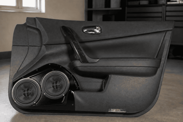 Vehicle door upgraded with a dual-speaker pod